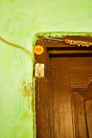 Photo for Door bell of wooden doors at Asansol ; West Bengal ; India - Royalty Free Image
