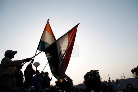 Photo for Audience in retreat ceremony called lowering flag at India-Pakistan international border ; Wagah border ; Attari ; Punjab ; India - Royalty Free Image