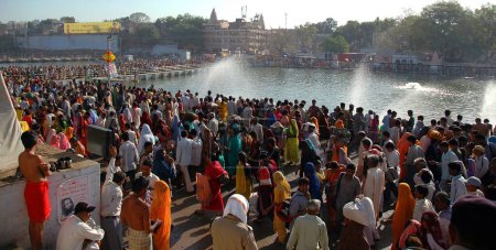 Photo for Crowd of Indian men pilgrims on banks of river Shipra, Ujjain kumbh mela fair, Madhya Pradesh, India - Royalty Free Image