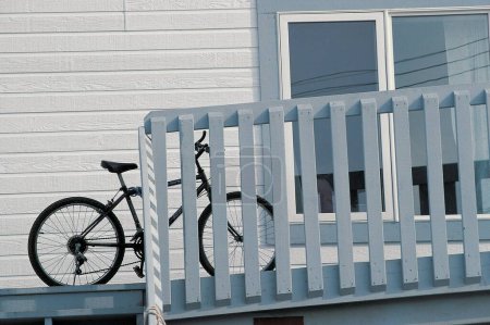 Bicycle at wooden fence ; Baffin Island; Canada