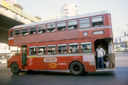 Photo for Double decker best bus carrying passengers, bombay mumbai, maharashtra, india - Royalty Free Image