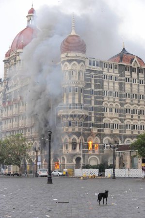 Photo for Fire inside the Taj Mahal hotel ; after terrorist attack by Deccan Mujahideen on 26th November 2008 in Bombay Mumbai ; Maharashtra ; India - Royalty Free Image