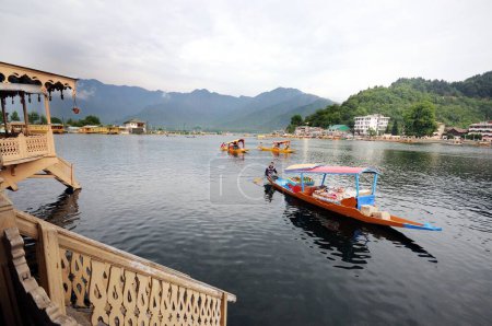 Photo for Canoe shikaras in dal lake , Srinagar , Jammu and Kashmir , India - Royalty Free Image