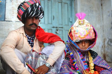 Photo for Rural groom with father in child marriage at Mindiyada near Anjaar, Kutch, Gujarat, India - Royalty Free Image