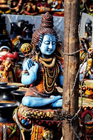 An idol of Lord Shiva of clay at the pottery shop, Clay model of Indian hindu God lord Shiva, Indian Gods and Goddesses.