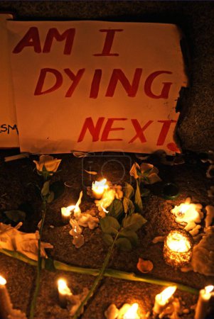 Photo for Condolences to terror attack victims by lighting candles and putting message across Bombay, Mumbai, Maharashtra India   30, November, 2008 - Royalty Free Image