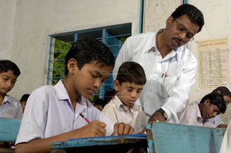 Photo for Boys in classroom of school at Ralegan Siddhi near Pune, Maharashtra, India - Royalty Free Image