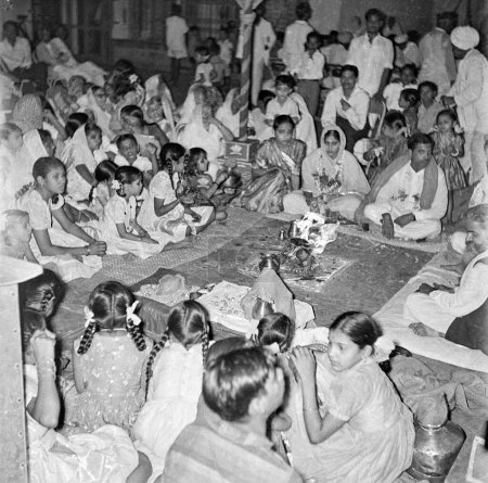 Photo for Old vintage 1900s black and white picture of Indian wedding marriage ceremony havan bride groom ritual India 1940s - Royalty Free Image
