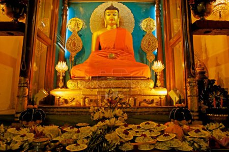 Photo for Statue of Gautam Buddha ; UNESCO World Heritage Mahabodhi temple ; Bodhgaya ; Bihar ; India - Royalty Free Image