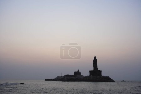 Photo for Sunrise view of  Vivekananda Memorial and statue of Tamil Poet Thiruvalluvar located on Rocky Islands ; Kanyakumari ; Tamil Nadu ; India - Royalty Free Image