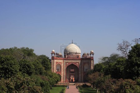 Photo for West gate , main entrance to Humayun's tomb built in 1570 made from red sandstone and white marble first garden-tomb on Indian subcontinent persian influence in mughal architecture , Delhi, India UNESCO World Heritage Site - Royalty Free Image