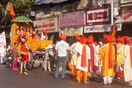 Photo for Lord Rama sita laxman in chariot with hanuman walking dramatic scene of Ramayana in procession for celebrating Gudi Padva festival ; Thane ; Maharashtra ; India - Royalty Free Image