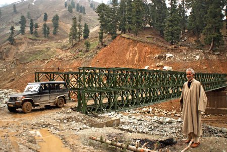 Photo for Vehicle on bridge under constructed site of mughal road, Jammu and Kashmir, India 8 April 2008 - Royalty Free Image