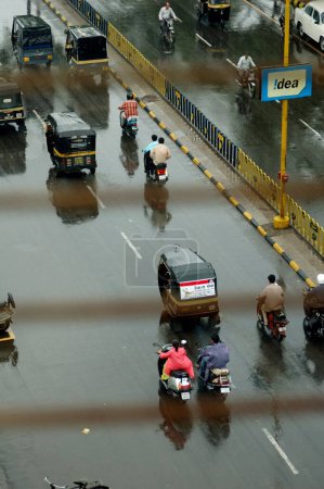 Photo for Monsoon traffic at race course road, Rajkot, Gujarat, India - Royalty Free Image