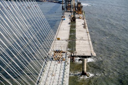 Photo for View of under construction Bandra Worli sea link is 8 lane twin carriageway cable stayed bridge ; Bombay Mumbai ; Maharashtra ; India - Royalty Free Image
