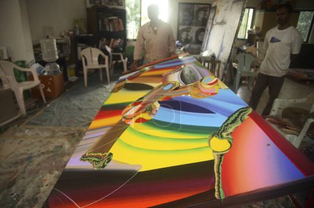 Photo for Indian contemporary artist Bose Krishnamachari in his studio working on canvas, Bombay Mumbai, Maharashtra, India - Royalty Free Image