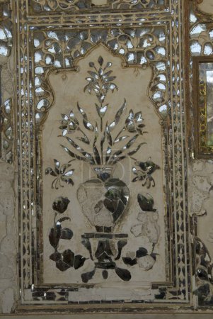 Art work in Sheesh mahal in Amber fort ; Jaipur ; Rajasthan ; India