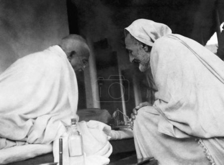 Photo for Mahatma Gandhi and Khan Abdul Gaffar Khan at Khadi Pratishthan ; Sodepur ; 24 Parganas ; Calcutta ; 1946  ; India - Royalty Free Image
