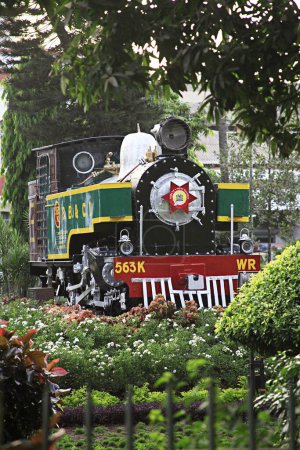 Photo for Old steam rail engine at Mumbai central terminus at Dr. Anand Nair Marg called as Lamington road ; Bombay now Mumbai ; Maharashtra ; India - Royalty Free Image