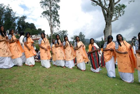 Photo for Toda women sang and danced in a circle during Toda wedding, Nilgiris, Tamil Nadu, India - Royalty Free Image