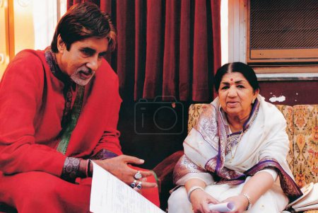 Photo for South Asian Indian actor Amitabh Bachchan and Lata Mangeshkar at an award function at Shanmukhand hall - Royalty Free Image