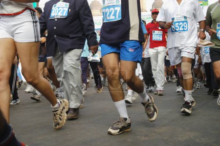 Photo for People running in international marathon 2005 in, Bombay, Mumbai, Maharashtra, India - Royalty Free Image