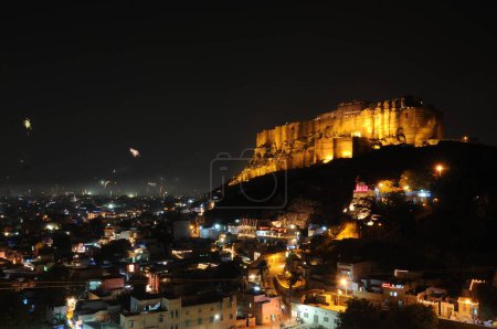 Photo for Mehrangarh fort in different color lighting and old city in night view , Jodhpur , Rajasthan , India - Royalty Free Image