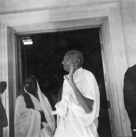 Photo for Mahatma Gandhi and Manibehn Patel at Anand Bhavan ; Allahabad ; 1941 ; India - Royalty Free Image