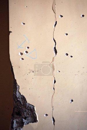 Photo for Bullet marks on wall of nariman house jewish community centre by deccan mujahedeen terrorists attack in Bombay Mumbai, Maharashtra, India 17 February 2009 - Royalty Free Image