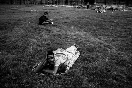 Photo for Man laying on grass, Kolkata, west Bengal, India, Asia - Royalty Free Image
