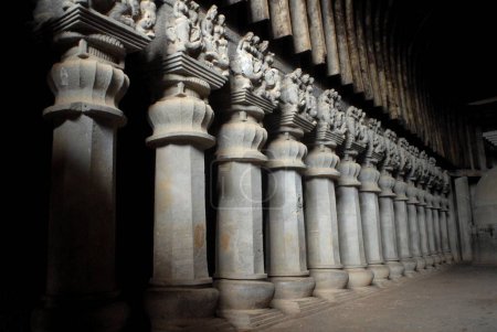 Photo for Buddhist caves built 3rd  2nd century BC by Buddhist monks one of the finest examples of ancient rock cut caves in Karla caves ; Maharashtra ; India - Royalty Free Image