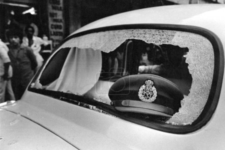 Photo for Police car with broken glass during riots, Mumbai, Maharashtra, India, Asia, 1900s - Royalty Free Image