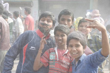 Photo for Boys celebrating holi festival, mathura, uttar pradesh, india, asia - Royalty Free Image