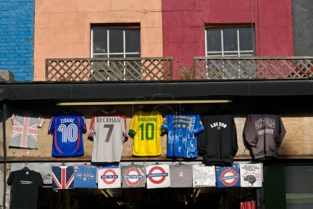 Photo for Foot ball jerseys for sale ; Camden town market ; London ; U.K. United Kingdom England - Royalty Free Image