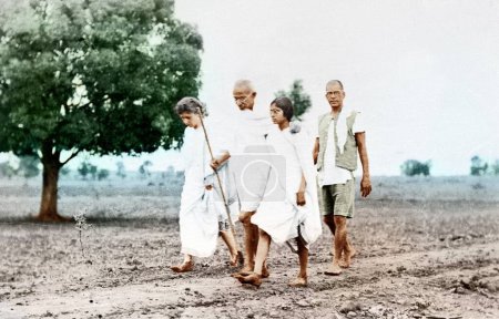 Photo for Mahatma Gandhi and associates on his daily walk, Wardha, Maharashtra, India, Asia, November 1933 - Royalty Free Image