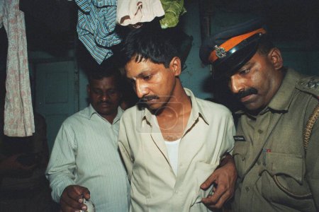 Foto de Notorio gángster de la pandilla Arun Gawlis Sunil Ghate fue arrestado por la policía de Mumbai, India - Imagen libre de derechos