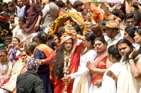 Photo for Laxmi narayan tripathi holding goddess idol on head, madhya pradesh, india, asia - Royalty Free Image
