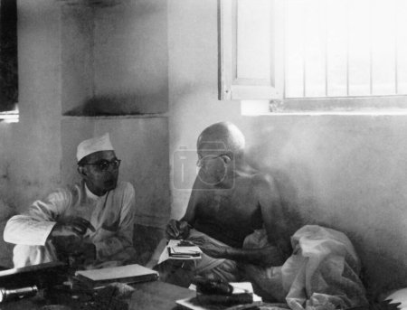 Photo for Mahatma Gandhi and Pyarelal Nayar at Bhangi Colony in Delhi, 1946, India - Royalty Free Image