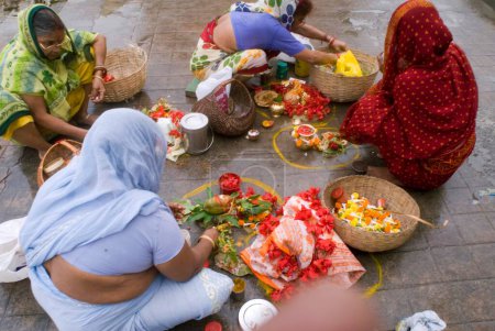 Photo for Women praying at a ghat, Kolkata, West Bengal, India - Royalty Free Image