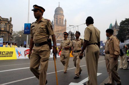 Photo for Police patrolling on street, Bombay Mumbai, Maharashtra, India 2009 - Royalty Free Image