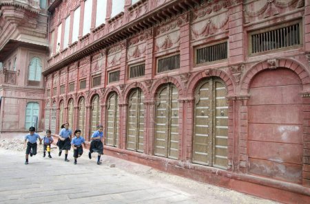 Photo for School girls and boys running Rampuria Haveli in Bikaner at Rajasthan India Asia - Royalty Free Image