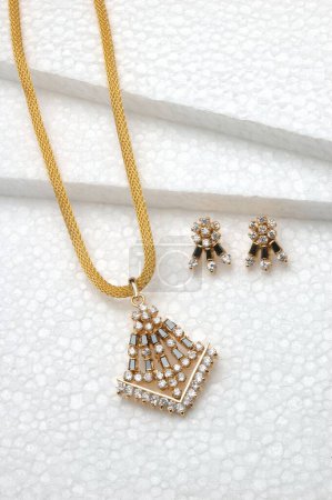 Photo for Diamond jewellery pendant with earring set in gold diamond with black sapphire black onyx - Royalty Free Image