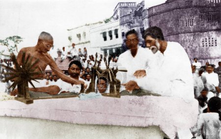 Photo for Mahatma Gandhi and Dr P C Ray participating mass spinning, Calcutta, India, Asia, May 1925 - Royalty Free Image