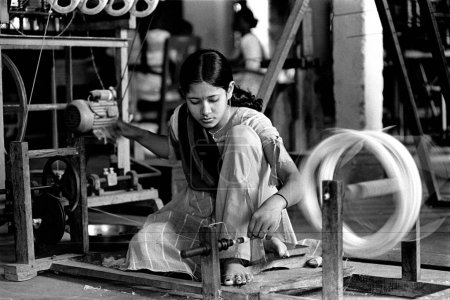 Photo for Bodo woman weaving on handloom, Assam, India - Royalty Free Image