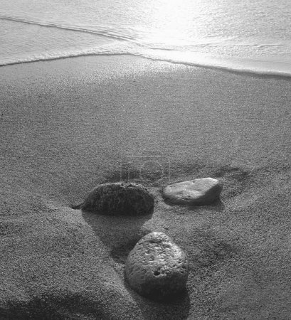 Pebbles on sand ; Porbandar area of Gujarat ; India