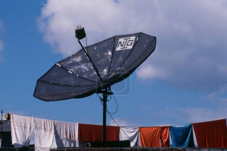 Clothes line and dish antenna in Gangtok, Sikkim, India