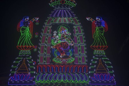 Photo for Illuminated lord Ganesha dancing, Pune, Maharashtra, India, Asia - Royalty Free Image