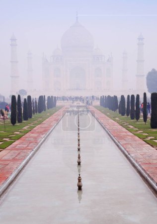 Fog surrounding Taj Mahal in morning ; Agra ; Uttar Pradesh ; India