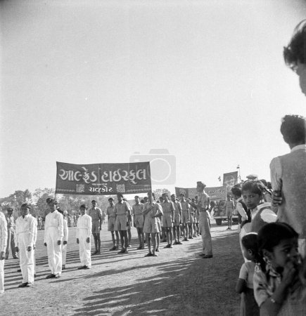 Photo for Old vintage 1900s black and white picture of Indian parade Alfred High School RSS Auxiliary Cadet Corps Mahatma Gandhi Rajkot Gujarat India 1940s - Royalty Free Image