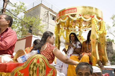 Photo for Transgender sitting in horse cart, ujjain, madhya pradesh, india, asia - Royalty Free Image